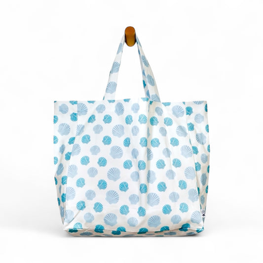 Nantucket bay scallop tote bag in eco-friendly cotton with blue coastal scallop pattern