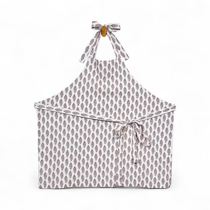 Sanibel junonia apron in French linen cotton with cocoa shell pattern and ties