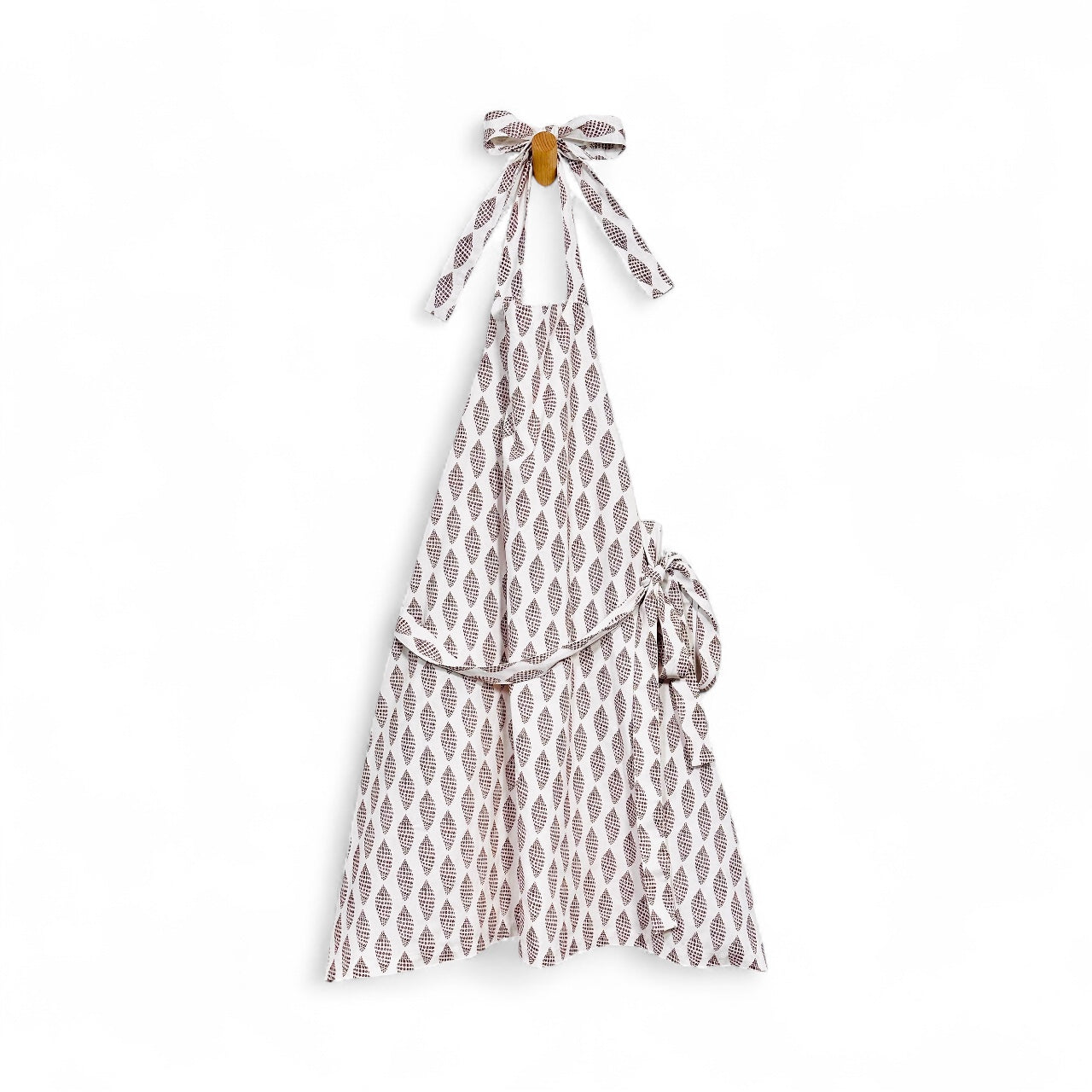 Sanibel junonia apron in French linen cotton with cocoa shell pattern and ties