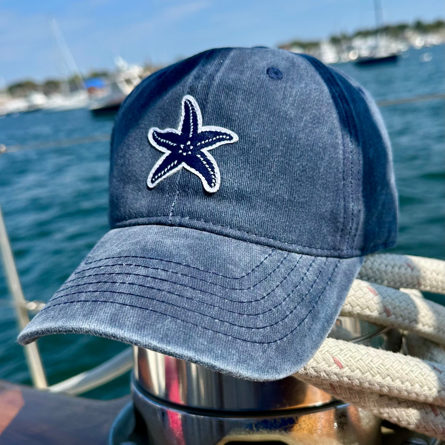 Signature starfish baseball cap in washed cotton with blue embroidered starfish design 