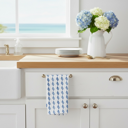 Tarpon Bay tulip shells tea towel in French linen cotton with blue striped shell pattern